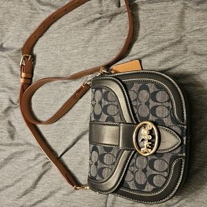 Coach Black and Brown Crossbody Bag with Monogram Pattern and Gold Emblem